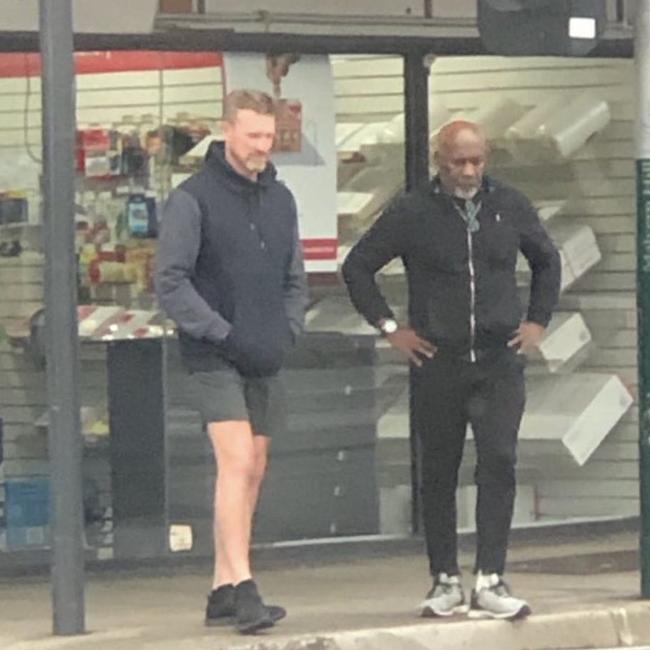 Nathan Buckley spotted walking with North Melbourne CEO Ben Amarfio.