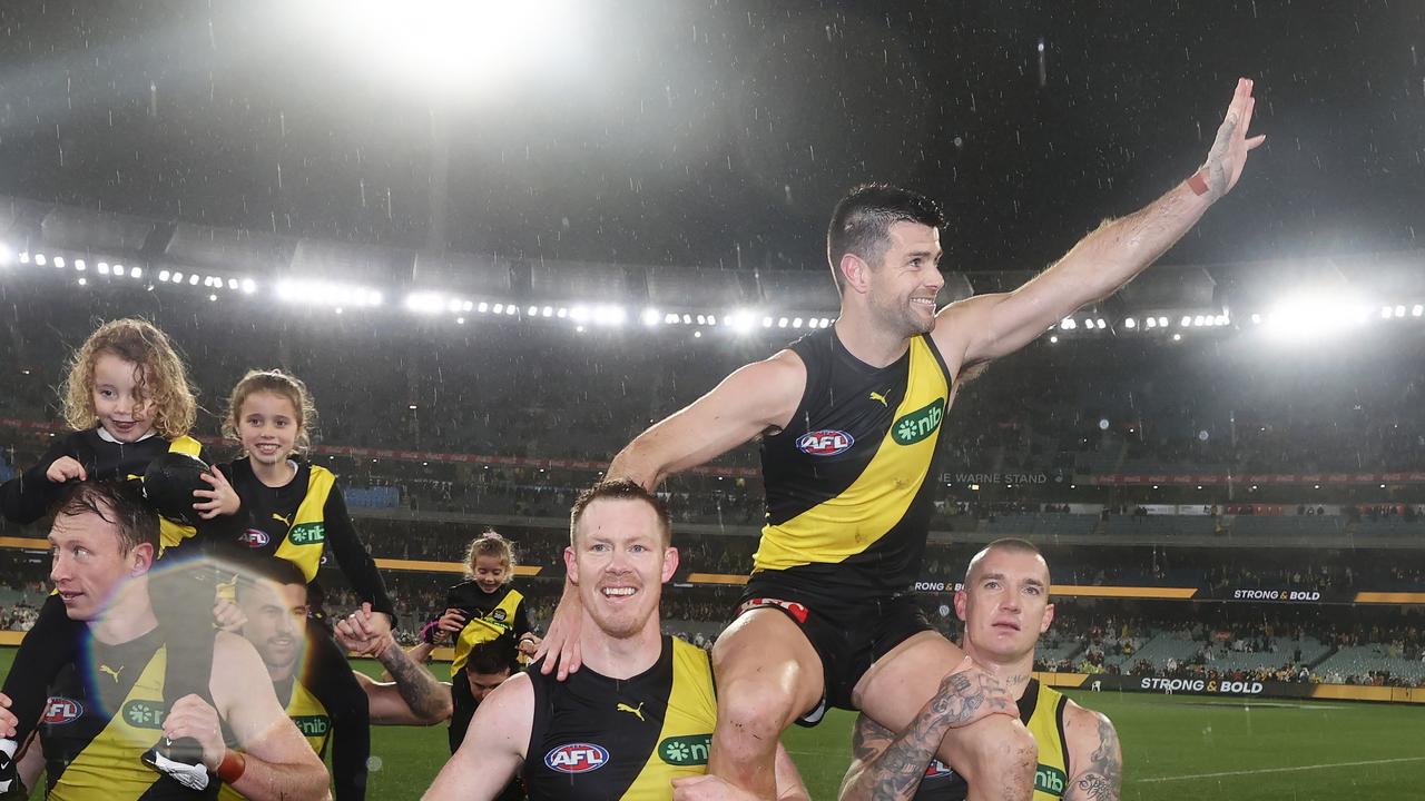 Trent Cotchin carried off after his 300th game. Photo by Michael Klein.