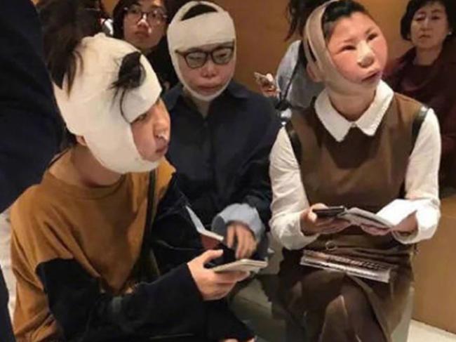 The women — wrapped chin-to-dome in bandages — were barred from boarding a flight home at an airport in South Korea.