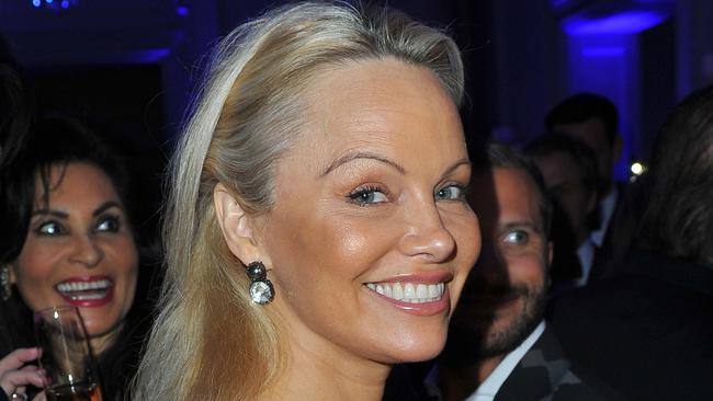 Pamela Anderson is unrecognisable as she shows off her iconic cleavage ...