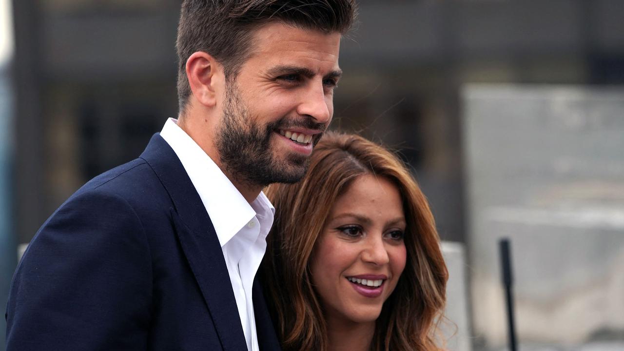 Shakira in 2022 with then partner Spanish football player Gerard Pique. (Photo by Bryan R. Smith / AFP)