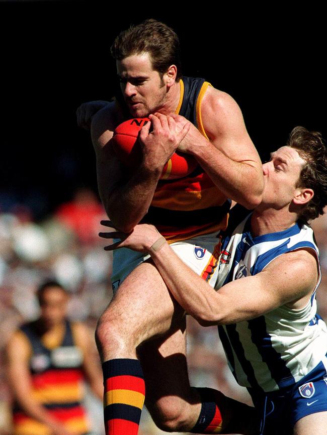 Mark Ricciuto in action during the 1998 AFL Grand Final.