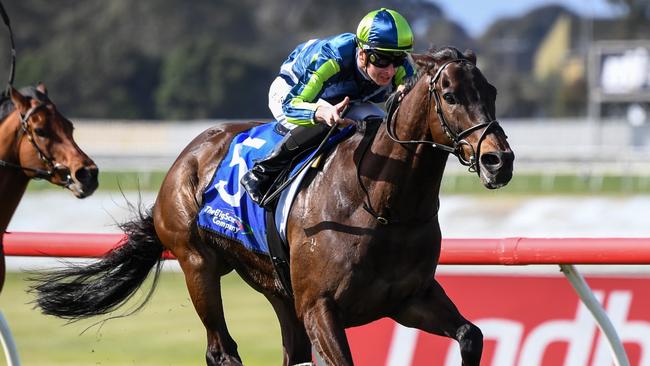 Teo Nugent surging to victory aboard Floating Artist at Sandown Hillside. Picture: Racing Photos