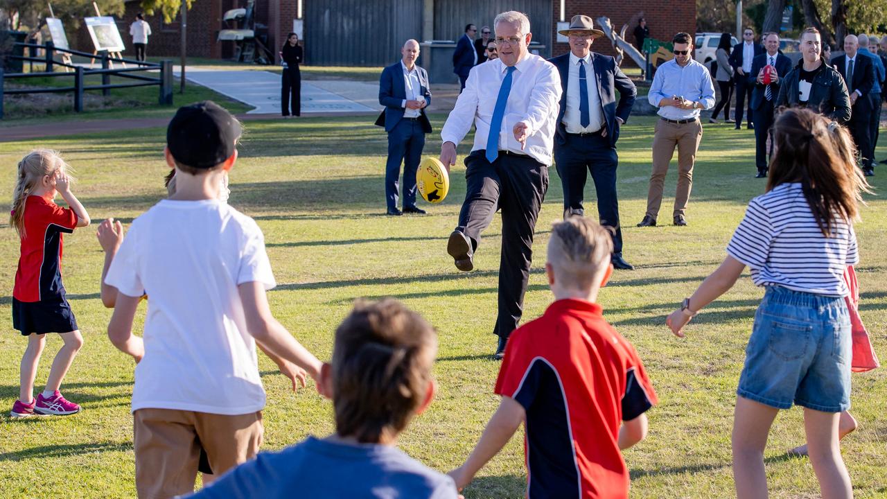 The kids enjoyed the footy with the PM. Picture: Jason Edwards