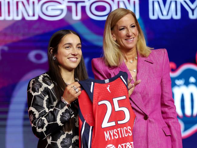NEW YORK, NEW YORK - APRIL 14: (L-R) Georgia Amoore poses for a photo with WNBA Commissioner Cathy Engelbert after being selected with the sixth overall pick by the Washington Mystics during the 2025 WNBA Draft at The Shed on April 14, 2025 in New York City. NOTE TO USER: User expressly acknowledges and agrees that, by downloading and or using this photograph, User is consenting to the terms and conditions of the Getty Images License Agreement. (Photo by Elsa/Getty Images)
