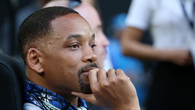 Will Smith watches the action on centre court. Photo: Michael Klein