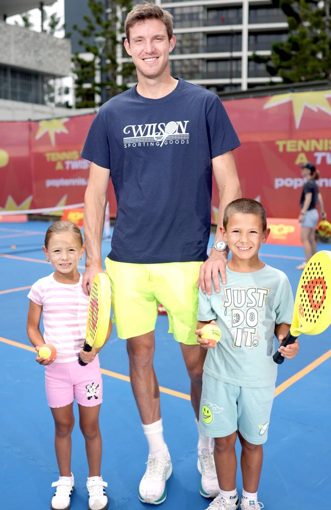 Nicolas Jarry with Mia, 5, and Dragan Radmanovic, 7, at Pat Rafter Arana. Picture: Steve Pohlner