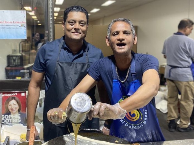 Owner of the murtabak chicken stall Rahamat Ullah (pictured left) at the Ramadan Night Markets. Picture: Kirsten Jelinek.