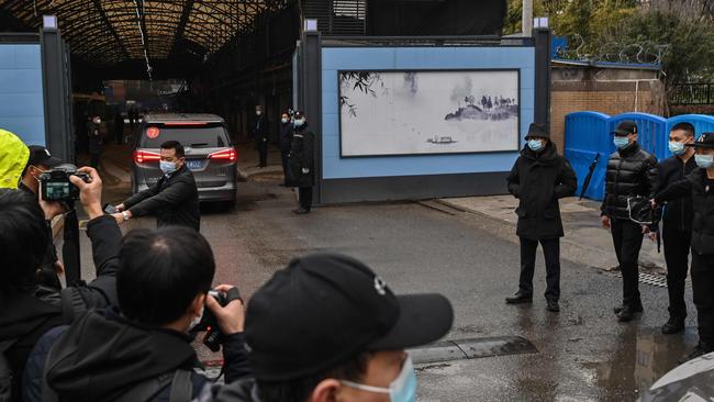 Members of the World Health Organization (WHO) team, investigating the origins of the COVID-19 coronavirus, arrive at the sealed Huanan Seafood wholesale market in Wuhan. Picture: Hector Retamal/AFP