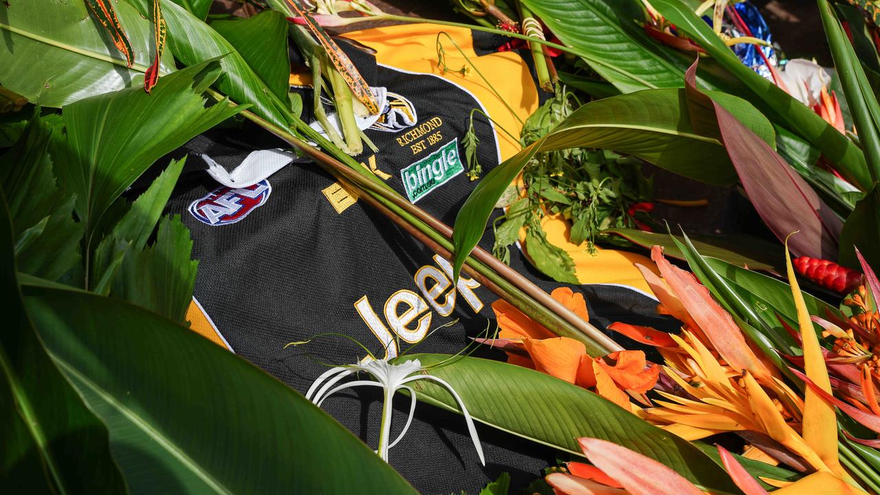 In honour of Declan Laverty’s favourite team, a Tigers jersey lay among the flowers at Parliament House. Picture: Pema Tamang Pakhrin