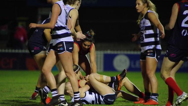 South's Nikki Gore (far right) watches on as South Adelaide and Norwood battle for the ball during their semi-final clash at Norwood Oval on Friday night. Picture: John Emery