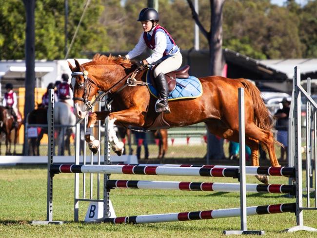 Kalani Brocerick and Lil Ruf N Tuf at the PQC State Showjumping Championships 2023.