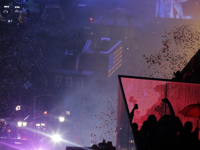 Confetti drops over the crowd as the clock strikes midnight during the New Year's celebration in Times Square. Picture: AP