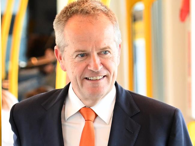 Federal Leader of the Opposition Bill Shorten takes a ride on the light rail on the Gold Coast, Monday, March 11, 2019.  (AAP Image/Dan Peled) NO ARCHIVING