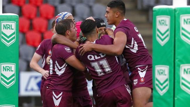 Action from the Australian state schools national rugby league championship match between Queensland Maroon and NSW CHS. QLD celebrates after Marley Mclaren scored a try. Picture: Tertius Pickard