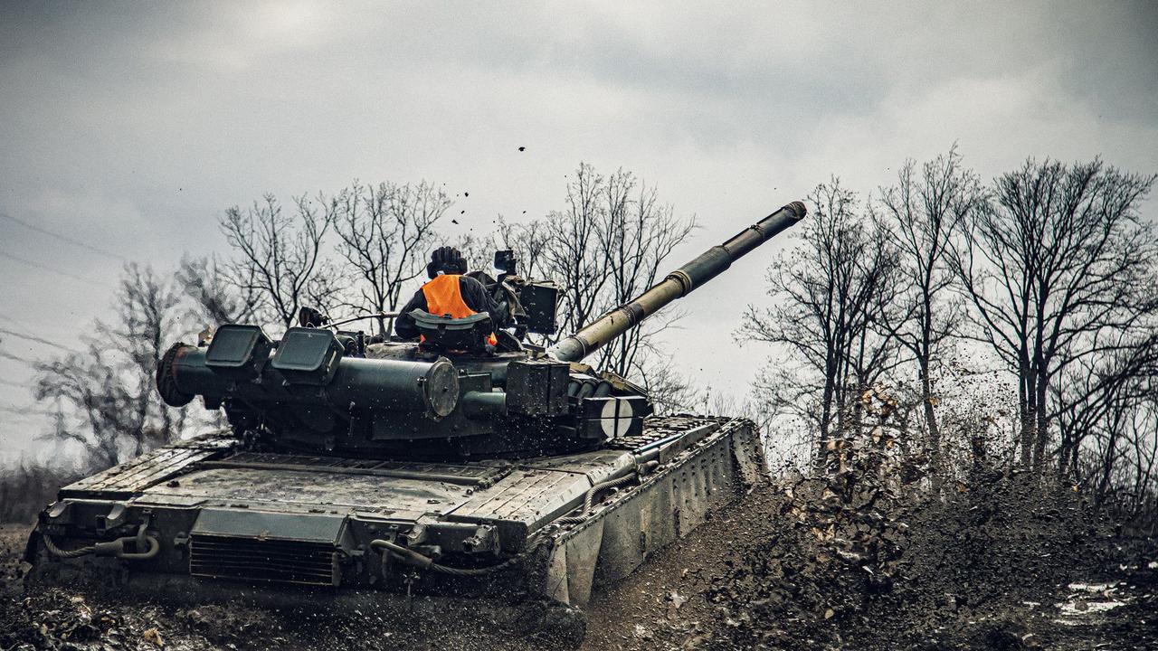 In an unknown location of Ukraine, servicemen take part in military exercises. Picture: AFP