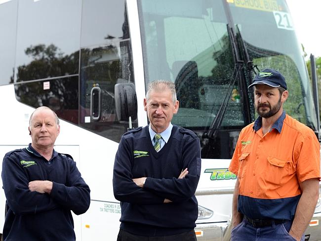 Australia’s worst road is the Glenelg Highway between Coleraine and Casterton, according to Trotters Coaches director Des Trotter (centre), flanked by operations manager Graeme Winsall and driver/mechanic Ian Schutz. Picture: Karla Northcott