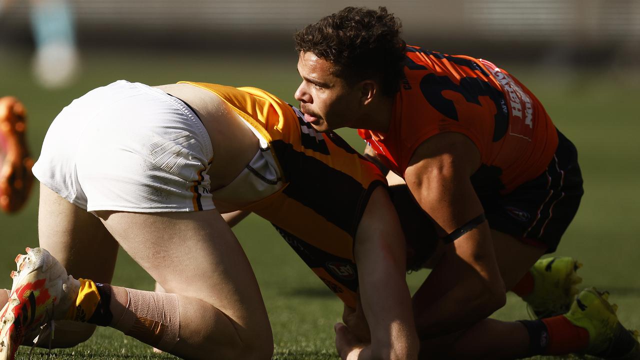 Grainger-Barras and Bobby Hill wrestle during the young Hawk’s eye-catching debut. Picture: Getty Images