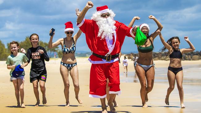 Santa Clause visiting Coolangatta beach on Christmas Day 2020. Picture: Nigel Hallett.