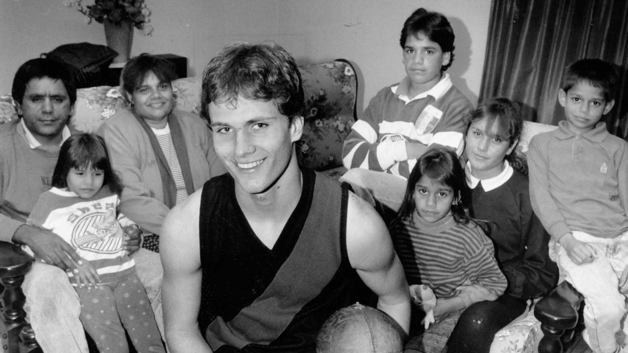 Wanganeen aged 17 at home in Para Vista with his family father Edmund, Alma-Jean, mother Cheryl, Stanford, Daisy, Rachel and James in 1990.