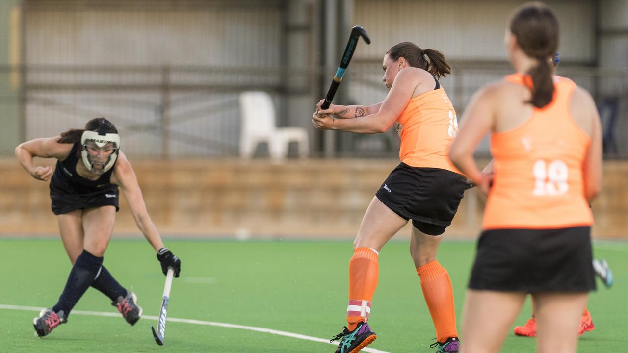 CS Vixens captain Amanda Ross (right) takes a shot during her side’s clash with Stafford Strikers in the Club Glenvale Challenge. Picture: Kevin Farmer