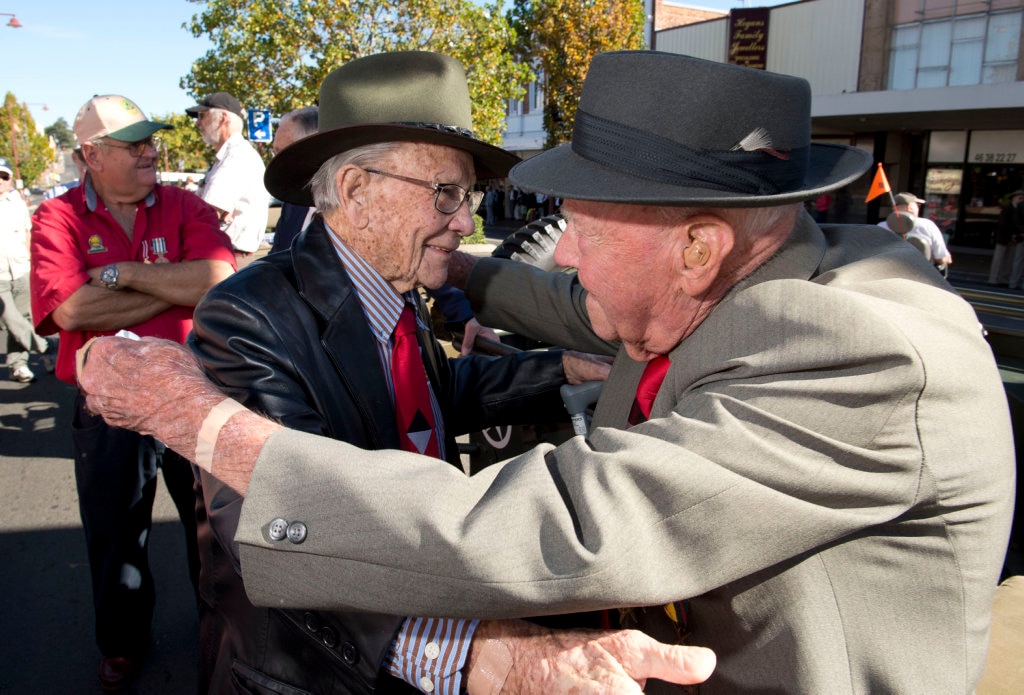 ( from left ) Richard McKenna and Bert Miles meet up before the parade. Anzac Day march. Photo Nev Madsen / The Chronicle. Picture: Nev Madsen