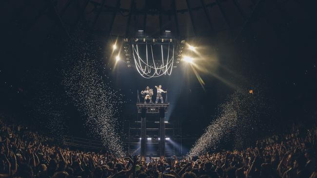 Charli XCX and Troye Sivan are hoisted above the crowd at Madison Square Garden in September. Picture: Rich Fury/MSG/Getty Images for MSG Entertainment Holdings, LLC