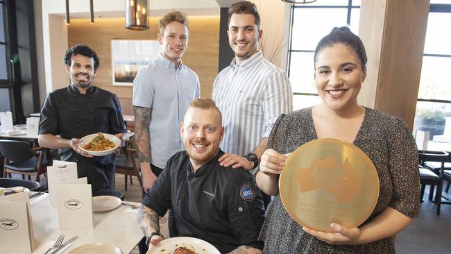 Mr McCracken in Essendon Fields won best metropolitan casual dining. Pictured are (from left) Mohamed Abdul Azeez, Jarryd Claruis, Adam Bayghan, Jordan Splendido and Niwetta Daniele. Picture: Ellen Smith