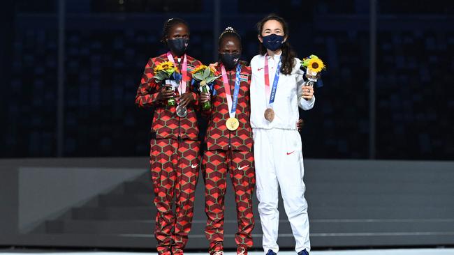 Brigid Kosgei, Peres Jepchirchir and Molly Seidel. Picture: AFP