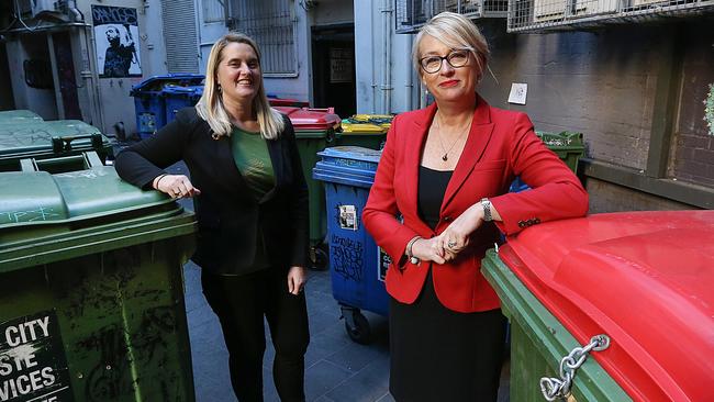 Lord Mayor Sally Capp and Cr Cathy Oke inspect waste services in a CBD lane. Picture: Ian Currie