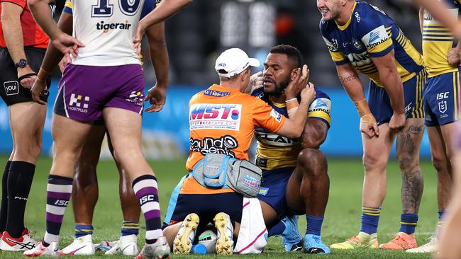 Parramatta’s Maika Sivo is attended to after being tackled during the match against Melbourne Storm. Picture: Phil Hillyard