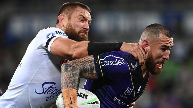 Jared Waerea-Hargreaves tries to reel in Nelson Asofa-Solomona. Picture: Quinn Rooney/Getty Images