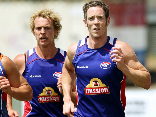 Western Bulldogs training at Whitten Oval. Robert Murphy runs with Daniel Giansiracusa and Mitch Wallis