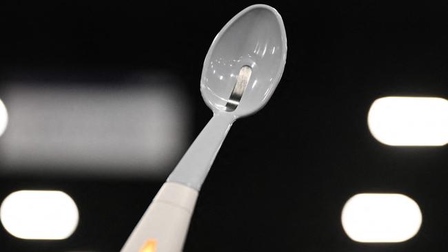 The Kirin Flavor-Enhancing Electronic Salt Spoon, which uses a weak electric current to concentrate sodium ion molecules food for increased Unami and salt flavor in low-sodium foods and encourage a lower salt diet, is displayed during CES Unveiled ahead of the Consumer Electronics Show (CES) in Las Vegas, Nevada on January 5, 2025. Gadgets, robots and vehicles imbued with artificial intelligence will once again vie for attention at the Consumer Electronics Show, as vendors behind the scenes will seek ways to deal with tariffs threatened by US President-elect Donald Trump. The annual Consumer Electronics Show (CES) opens formally in Las Vegas on January 7, 2025, but preceding days are packed with product announcements. (Photo by Patrick T. Fallon / AFP)