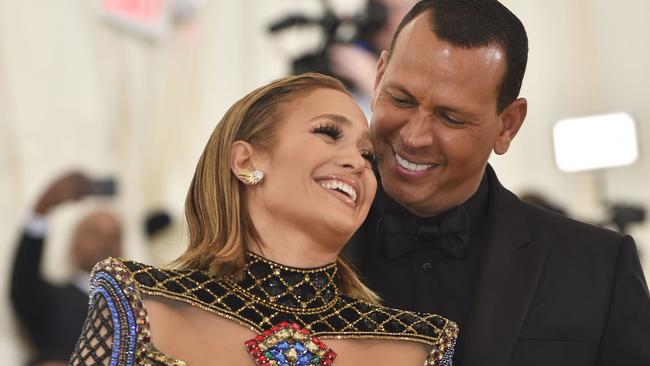 (FILES) In this file photo taken on May 7, 2018 Jennifer Lopez and Alex Rodriguez arrive for the 2018 Met Gala at the Metropolitan Museum of Art in New York. - Jennifer Lopez and fiance Alex Rodriguez have broken up, calling off their two-year engagement, US media reported on March 12, 2021. (Photo by Hector RETAMAL / AFP)