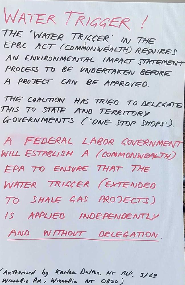 A corflute hung at Lingiari MP Marion Scrymgour's booth at the last federal election, promising expanded water trigger laws for shale gas projects.