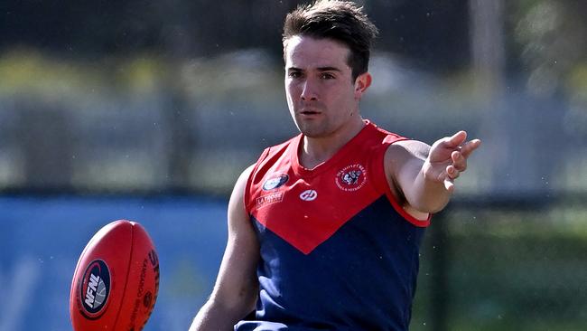 Lochlan Brannelly gets a kick for Diamond Creek. Picture: Andy Brownbill