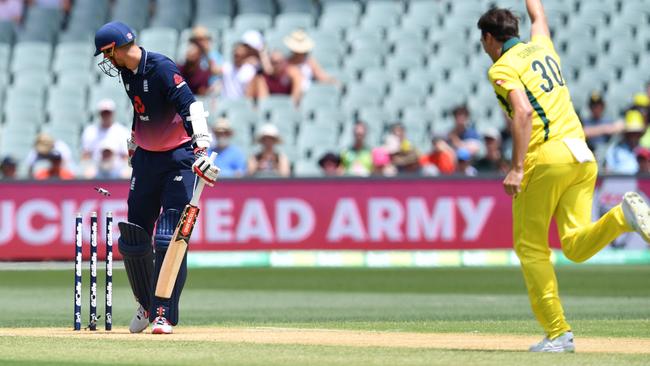 Pat Cummins picks up Alex Hales. Picture: AAP