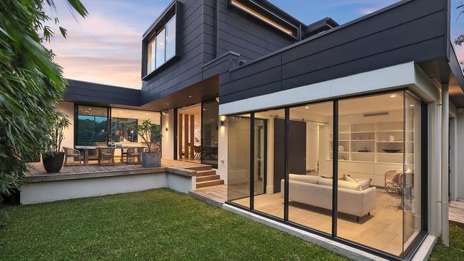 The contemporary home of Andrea Abel van Ens and Rob van Ens at Manly passed in on an $11m vendor bid.