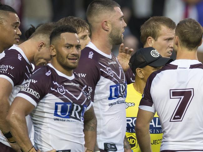 Dejected Manly Sea Eagles players during the Round 1 NRL match between Wests Tigers and the Manly-Warringah Sea Eagles at Leichhardt Oval in Sydney, Saturday, March 16, 2019. (AAP Image/Craig Golding) NO ARCHIVING, EDITORIAL USE ONLY