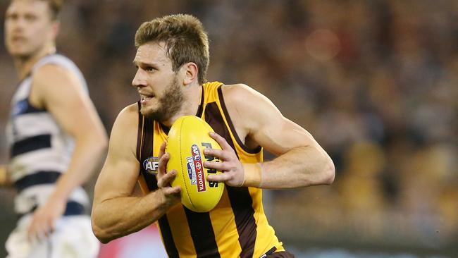 Second Qualifying Final. Geelong vs Hawthorn at the MCG. Grant Birchall cleans up across half back . Pic: Michael Klein