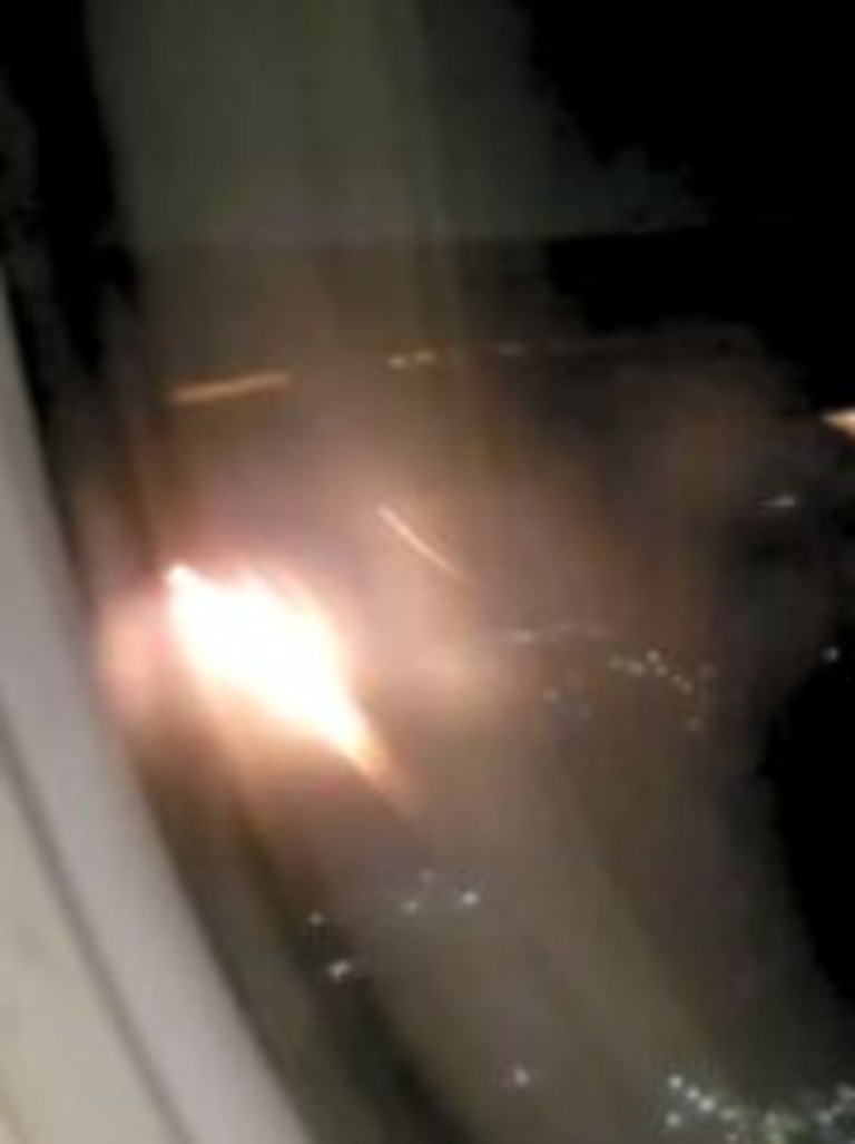 The engine burst into flames with 179 people on board. Picture: ViralPress.
