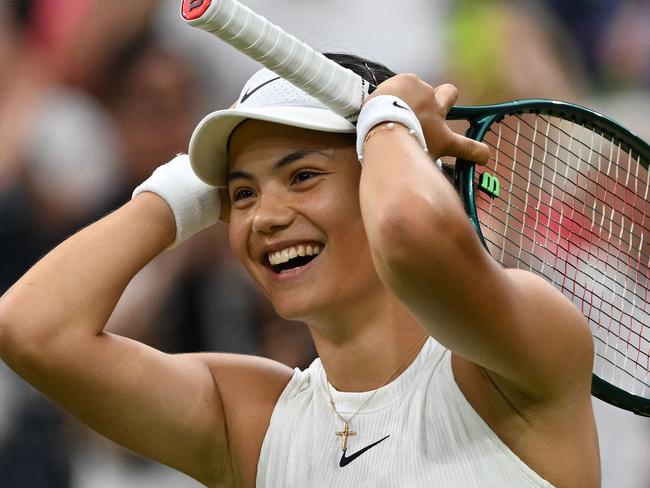 TOPSHOT - Britain's Emma Raducanu celebrates winning against Greece's Maria Sakkari during their women's singles tennis match on the fifth day of the 2024 Wimbledon Championships at The All England Lawn Tennis and Croquet Club in Wimbledon, southwest London, on July 5, 2024. (Photo by Glyn KIRK / AFP) / RESTRICTED TO EDITORIAL USE