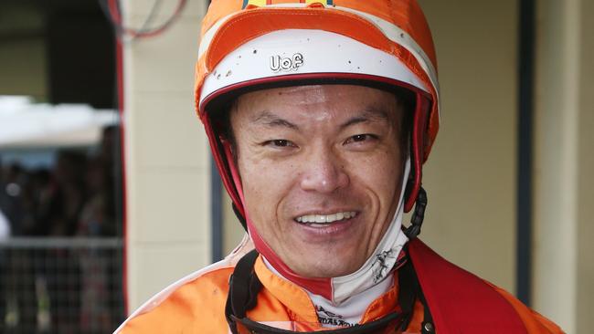 Masayuki Abe narrowly edged out Sylvester to win Race 3 riding War General at the Banana Industry Race Day, held at the Innisfail Turf Club. Picture: Brendan Radke