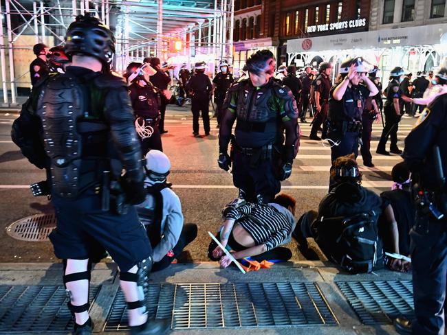 People are arrested after looting in New York City. Picture: Angela Weiss