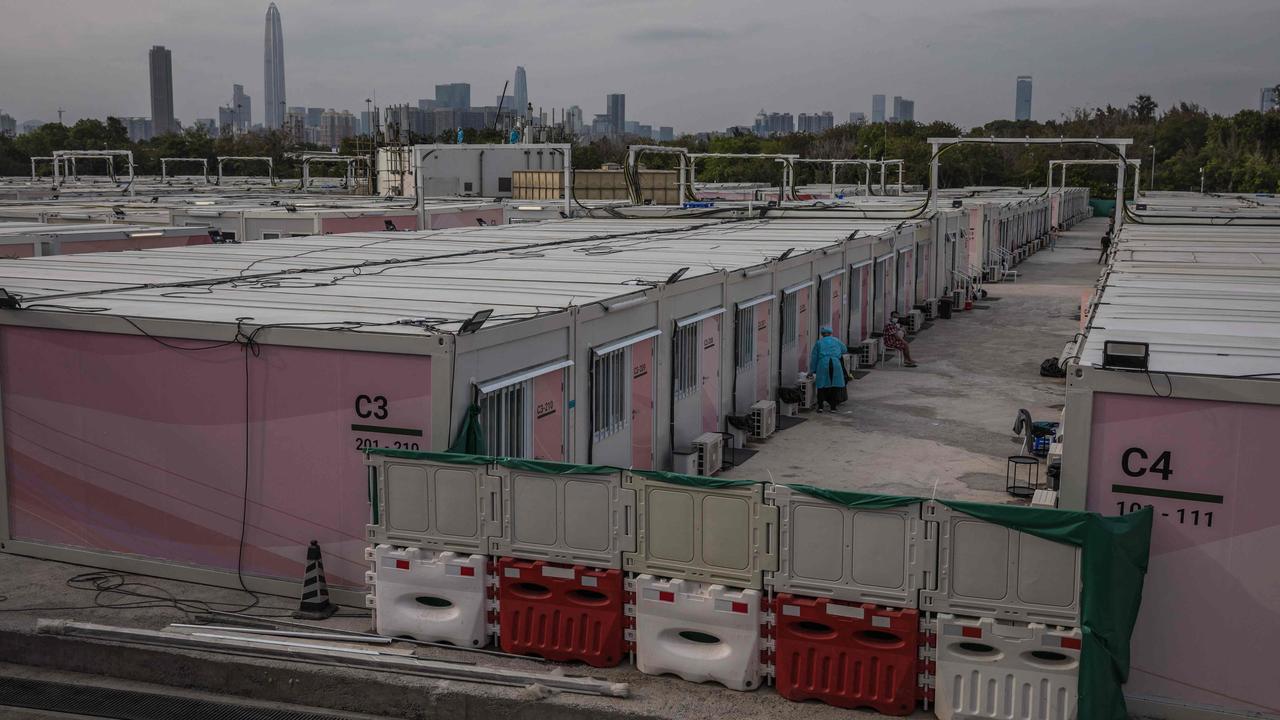 A temporary isolation facility for Covid-19 patients set up in the San Tin area of Hong Kong, with the Chinese city of Shenzhen in the horizon, on March 16. Picture: Dale de la Rey/AFP