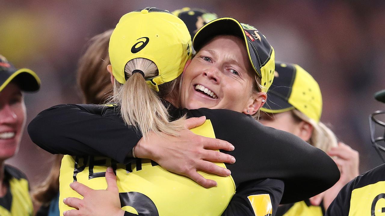 Ellyse Perry hugs captain Meg Lanning after the T20 World Cup final at the MCG. Picture: Michael Klein