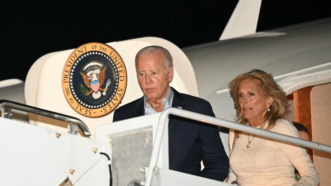 US President Joe Biden and First Lady Jill Biden step off Air Force One en route Camp David. Picture: AFP