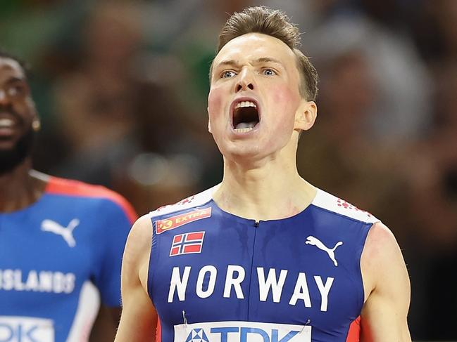 BUDAPEST, HUNGARY - AUGUST 23: Karsten Warholm of Team Norway celebrates winning the Men's 400m Hurdles Final during day five of the World Athletics Championships Budapest 2023 at National Athletics Centre on August 23, 2023 in Budapest, Hungary. (Photo by Christian Petersen/Getty Images for World Athletics)