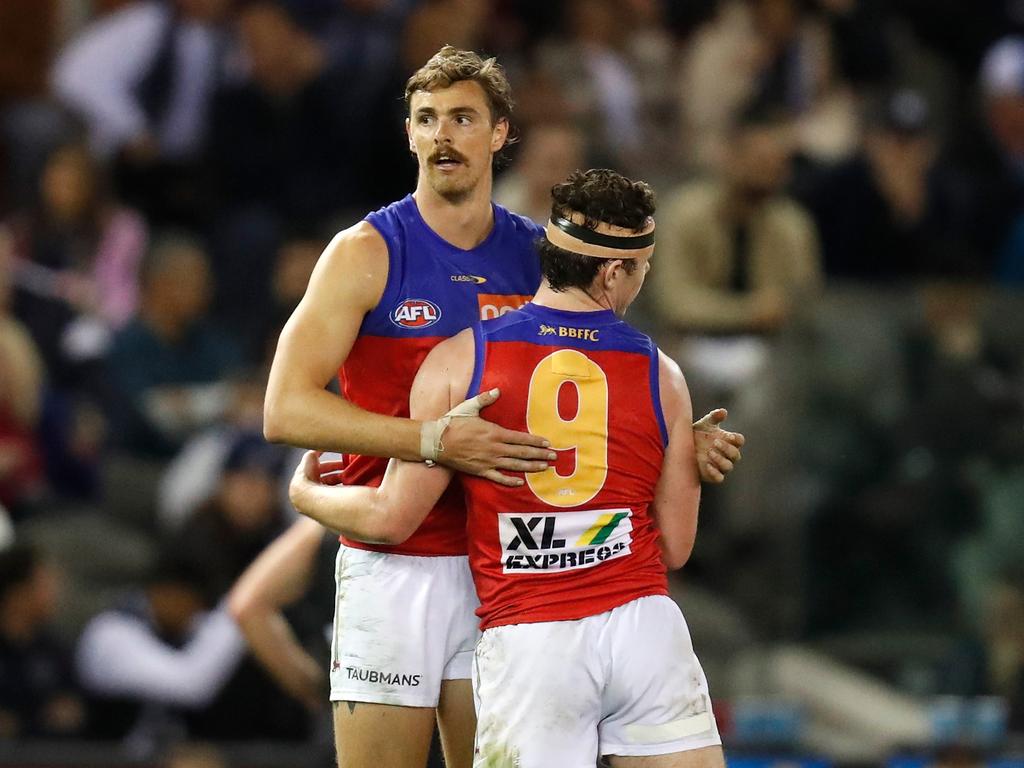 MELBOURNE, AUSTRALIA - APRIL 24: Joe Daniher (L) and Lachie Neale of the Lions celebrate during the 2021 AFL Round 06 match between the Carlton Blues and the Brisbane Lions at Marvel Stadium on April 24, 2021 in Melbourne, Australia. (Photo by Michael Willson/AFL Photos via Getty Images)